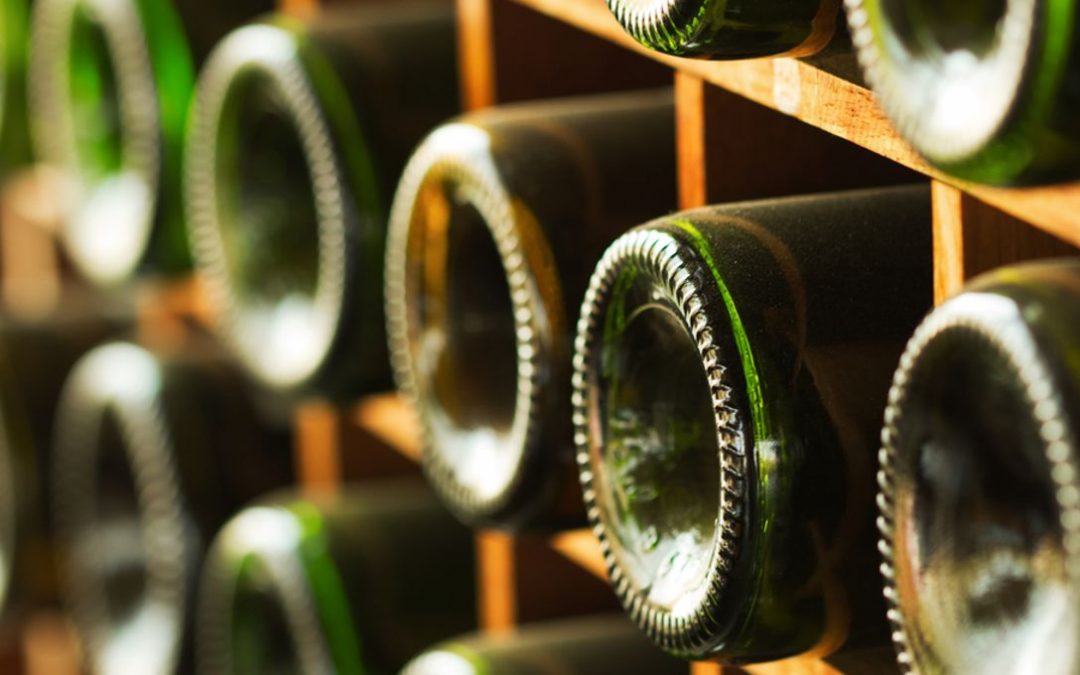 Wine Bottles Have a Dip in the Bottom to Help Create a Seal When the Cork is Inserted and to Help Prevent the Cork from Drying Out